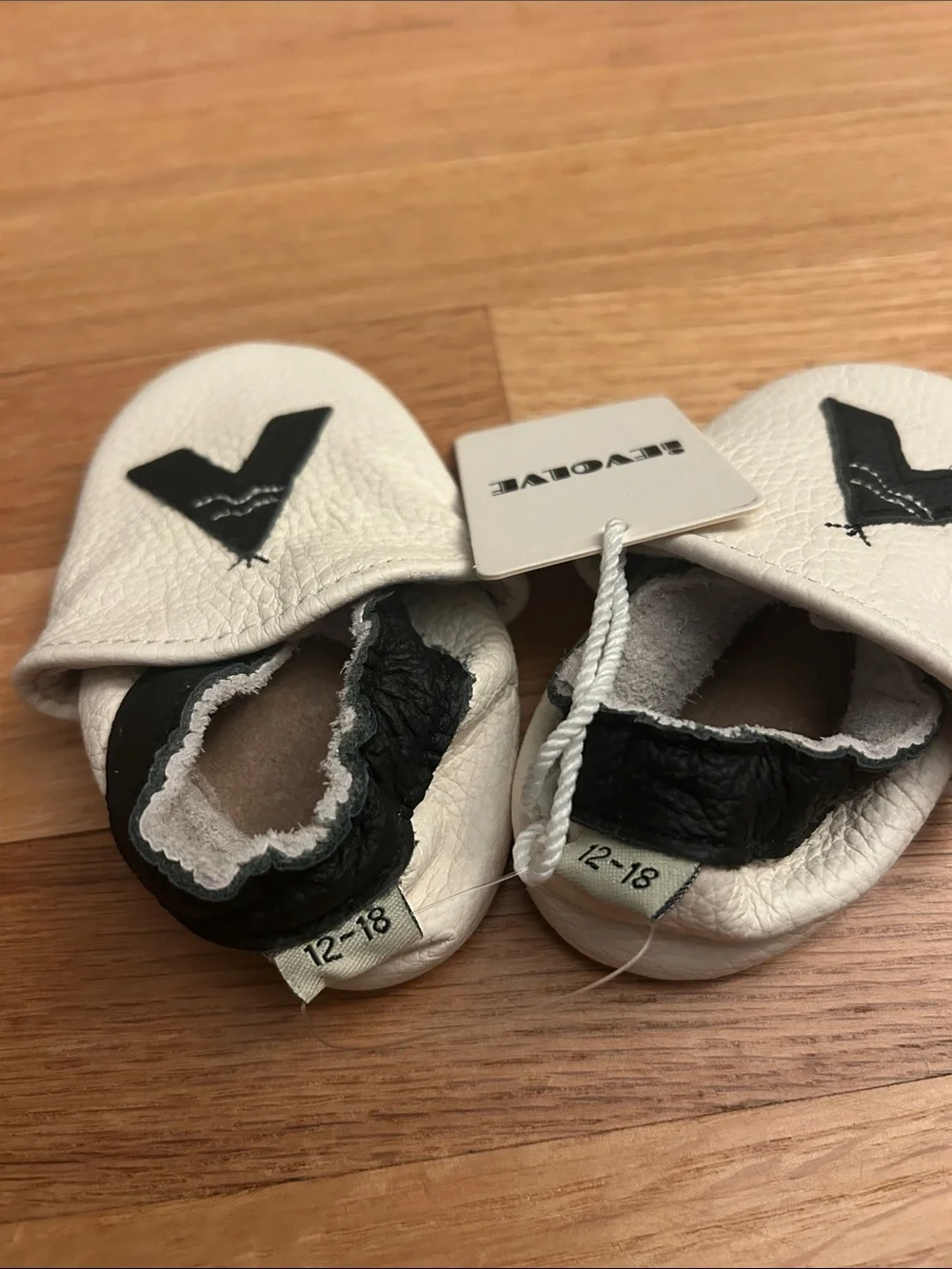 Baby/Toddler White Leather Moccasins with Black Teepee Accent